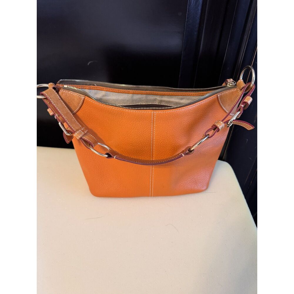 Dooney and Bourke Orange/Tan Pebbled Leather O-Ring Slouch Hobo Bag - Picture 4 of 8